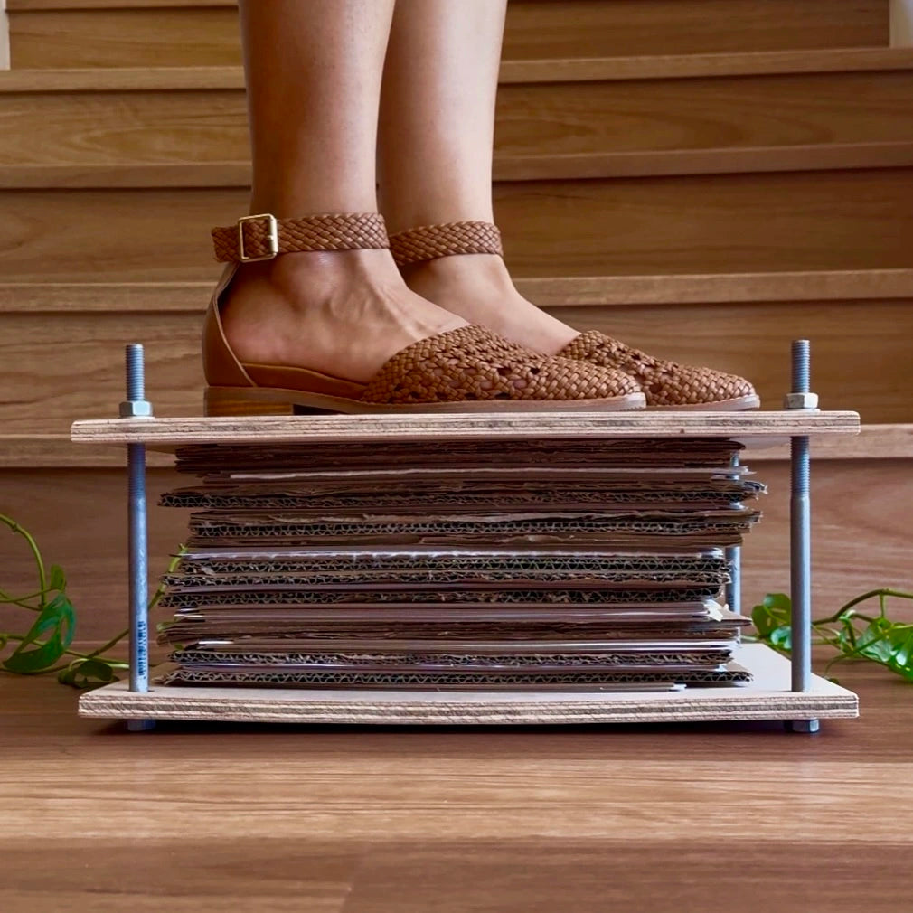 person standing on top of a full flower press